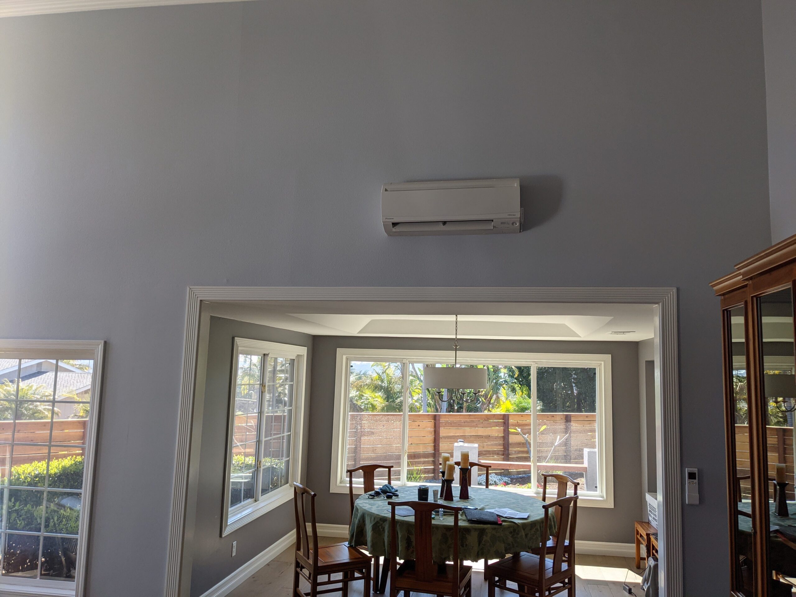 Ductless Mini Split indoor wall-mounted air conditioning unit installed above the window.