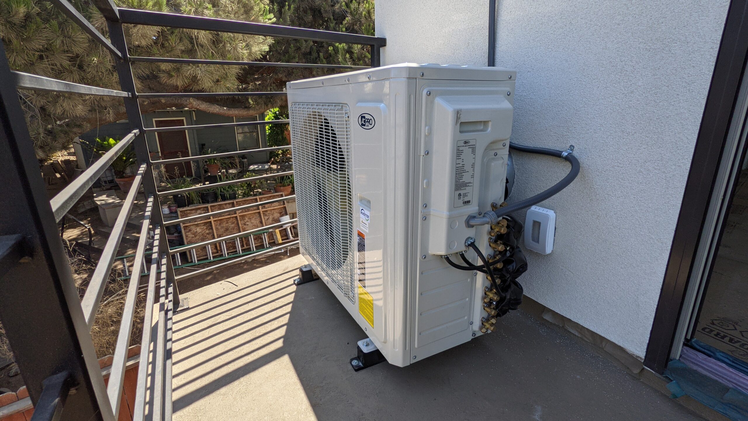 Corner view on a Mini Split Air Conditioner outdoor unit installed by Accord Air in San Diego.